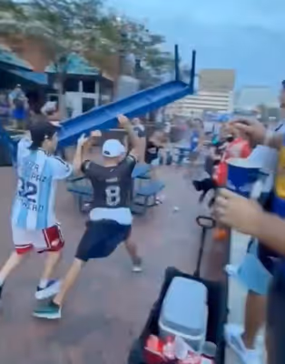 Argentina fans turn on each other as tables, benches fly in wild World Cup scene