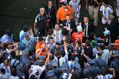 World Cup final chaos pours into stands as Argentina players' families 'detained'