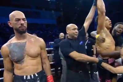 Andrew Tate's gruesome eye injury as he's left battered and bruised from boxing defeat