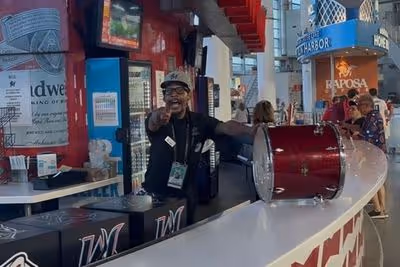 Three Lions fans invade Miami and even official drummer at baseball game bellows 'Let's go England'