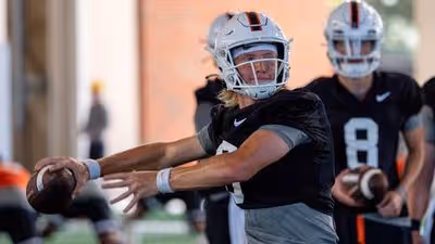 Cowboys' Road Clash Against Oregon Could Shape QB Battle
