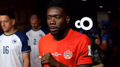 Alphonso Davies didn’t play in Canada’s opening World Cup match.