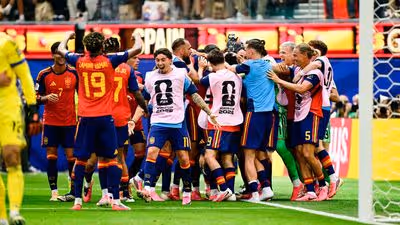 Spain celebrated another last-gasp win to keep its World Cup hopes alive.