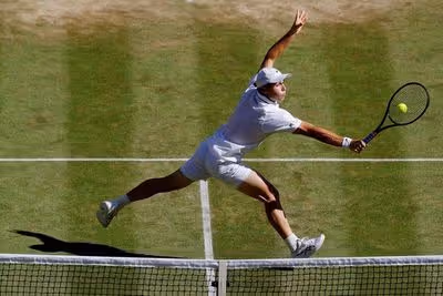 Tennis-Fery marches on as Britain's unlikely Wimbledon standard-bearer