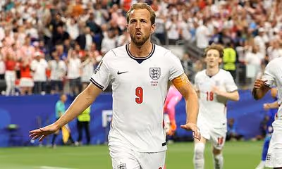 Harry Kane puts England ahead from the penalty spot in World Cup opener after seeing initial spot kick saved - before he was reprieved by VAR