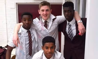 The Manchester schoolboys on opposite sides of England's World Cup last-32 game: How Marcus Rashford is going head-to-head with one of his closest childhood friends