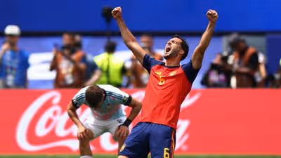 Spain seizes an opportunity late to propel themselves into the semi-finals