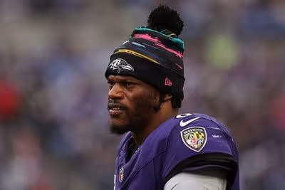 Lamar Jackson Exits vs. Titans with Left Ankle Injury; MRI Scheduled as Tyler Huntley Comes On