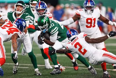 Chip Trayanum's Neck Injury Clouds Jets' Roster Decisions