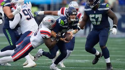 Sam Darnold exits season opener with right-hip injury, Drew Lock steadies offense as Seahawks face short-term uncertainty