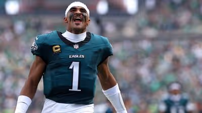 Hurts’ three TD passes and late defensive stands push Eagles past Commanders, 24-22