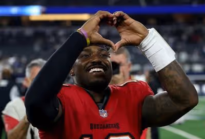 Bucs Shock Cowboys, Earn First Win Behind Irving, Daniels and Second‑Half Turnovers