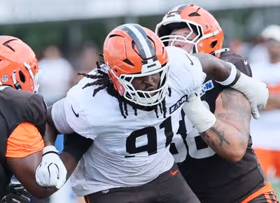 Analyzing the Cleveland Browns' Quarterback Situation: Shedeur Sanders vs. Deshaun Watson
