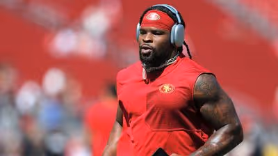 Dre Greenlaw Fined $11,941 for Taunting; Aqib Talib Urges Restraint